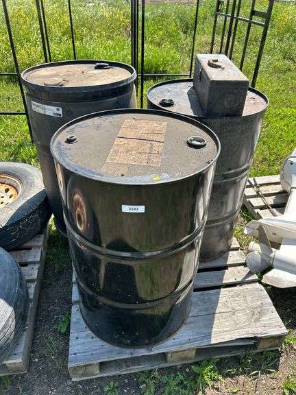 2 steel barrels, 1 plastic barrel & John Deere toolbox