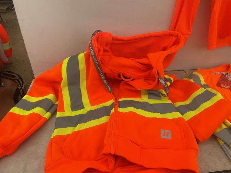 Quantity of size small safety shirts and a hoodie