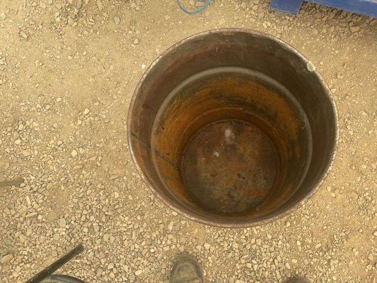 HUSKY 100 lb. grease barrel with lid removed