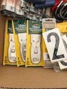 Qty of utility knives, qty of metal razor scrapers, pack of razor blades, qty of numbers, folding