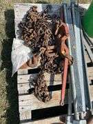 Pallet with logging chain, load binders , ice tongs etc
