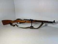 GUN: Believed to be 1946 6.5×52mm Carcano Model 38 rifle.