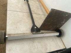 10x10 hand tamper and a Mastercraft yard magnet