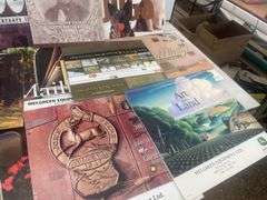 Quantity of John Deere and misc. calendars, misc journals and 1000 piece jigsaw puzzle