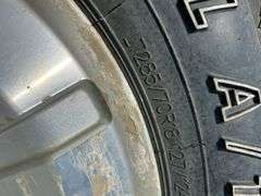 4 GM tires/rims LT285/70R18
