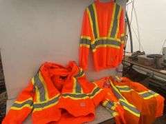 Quantity of size small safety shirts and a hoodie