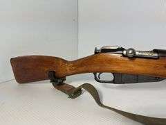 GUN: Believed to be 1946 6.5×52mm Carcano Model 38 rifle.