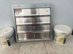 2 containers of tile adhesive and a fan louver 16"x16"