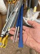 Electricians tape, hammers, turnbuckles & pry bars