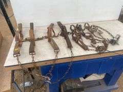 Qty of leg grab traps 2 double spring need repair