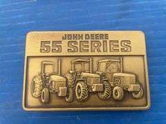 Pair of John Deere 55 series belt buckels