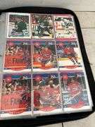Binder of hockey & baseball cards