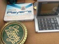 Box of collectible items including watches etc.