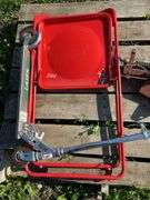Scooter, folding chair, clay pigeon catapult