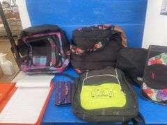 Quantity of hand bags comes with garbage can