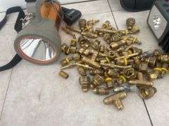 MotoMaster multi-function digital air compressor, qty of brass fittings, rechargeable flashlight,