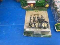 Misc 1:64 scale Johhn Deere toys, stainless steel thermos, and John Deere teddy bears etc