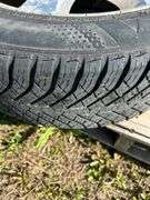 Pair of Nissan tires/rims 215/55R17