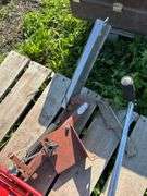 Scooter, folding chair, clay pigeon catapult