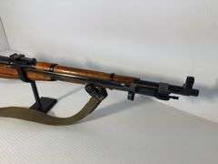 GUN: Believed to be 1946 6.5×52mm Carcano Model 38 rifle.