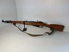 GUN: Believed to be 1946 6.5×52mm Carcano Model 38 rifle.