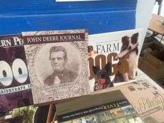 Quantity of John Deere and misc. calendars, misc journals and 1000 piece jigsaw puzzle