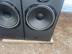 2 Techsonics speakers - one has damaged speaker cone - condition unknown - measure 32" H x 14" W x 1
