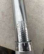 1/2" dr. torque wrench and a set step bits