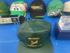 Quantity of John Deere caps including one that is autographed by "Chad Little", also paperweight and