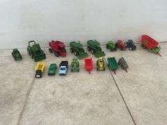 A number of 1:64 scale toys including  Ertl  are John Deere combines and case combine etc