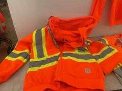 Quantity of size small safety shirts and a hoodie