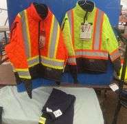 2 Hi-Viz quilted freezer jackets MEDIUMS and a pair of size 30 pants