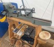 Delta 12" variable speed wood lathe, comes with tooling, face shield and sample bowls