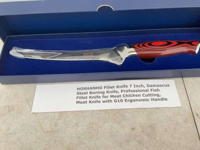Unused  7" Damascus, steel filleting knife