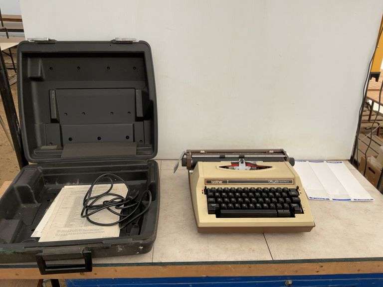 Vintage electric typewriter in case