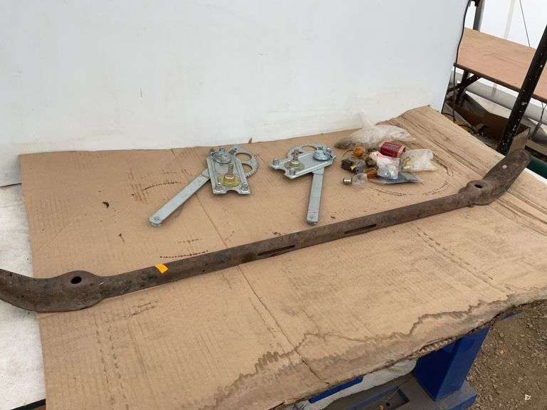 Set of unused window cranks for Model T, Model T light bar, and miscellaneous lightbulbs and brushes