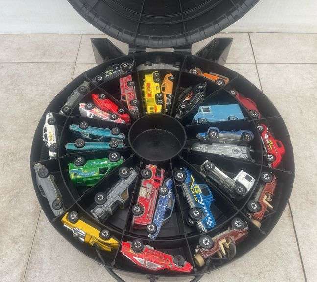 Quantity of diecast toys mostly hot wheels in case.