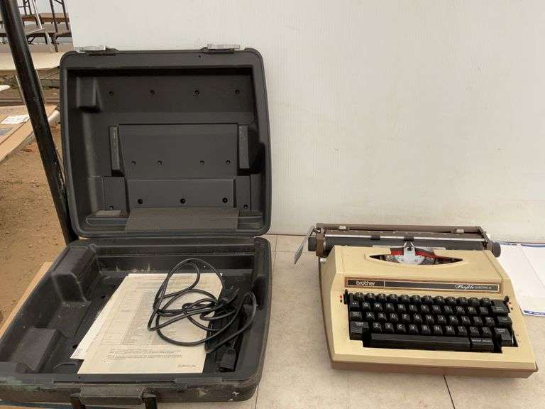Vintage electric typewriter in case