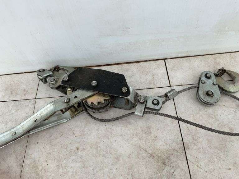 A strap come a long and a cable come a long