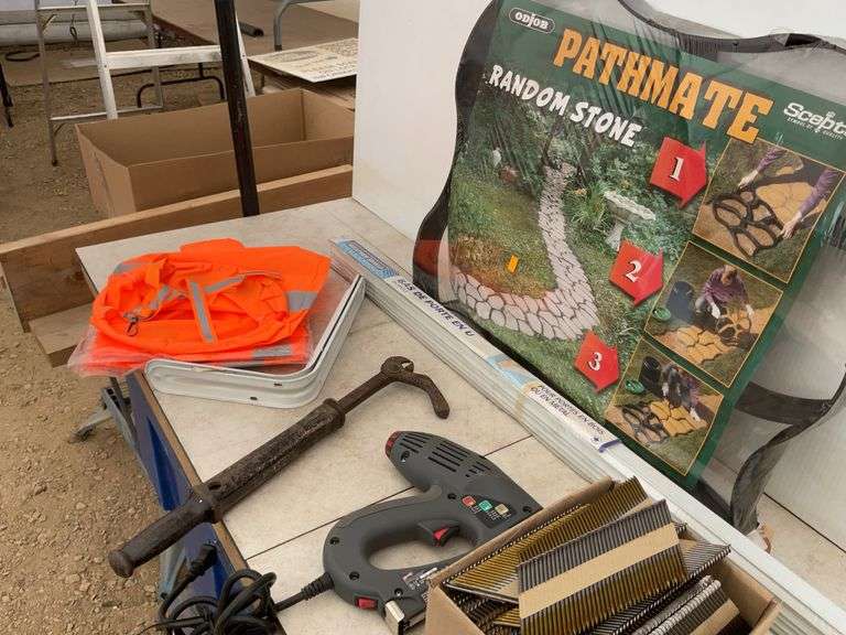 3 of 30" wind socks, quantity of 3" air nailer nails, electric stapler, nail puller, pathmate, etc.