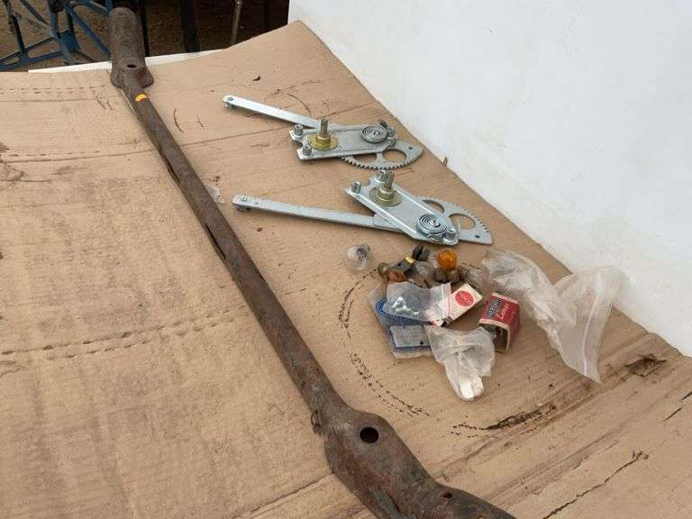 Set of unused window cranks for Model T, Model T light bar, and miscellaneous lightbulbs and brushes