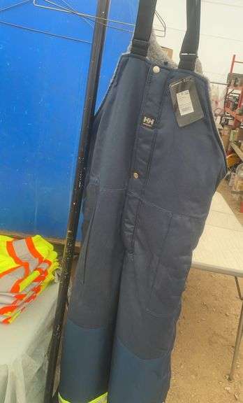 Helly Hansen 2XL insulated bib overalls, quantity of 4XL safety vests, 5XL PU stretch Hi-Viz Flame