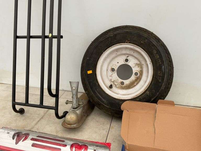 4.8 0x8 tire and four bolt hole rim, 1 7/8" hitch coupler, third brake light cover for a Dodge, end