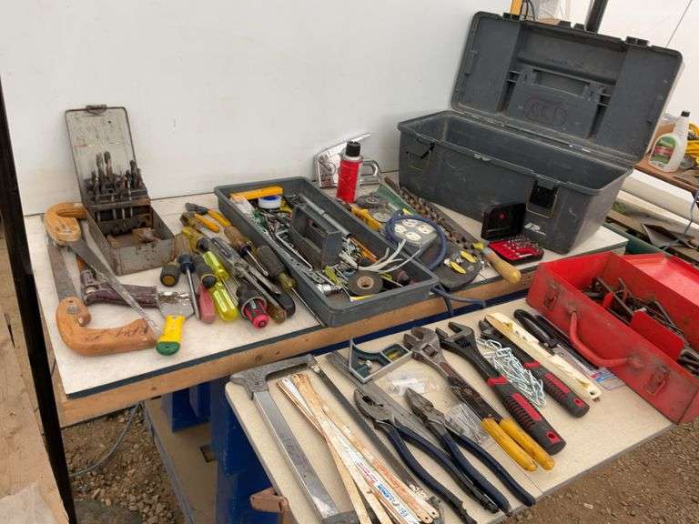 Plastic toolbox comes with the quantity of miscellaneous tools, including crescent  wrenches, screwd