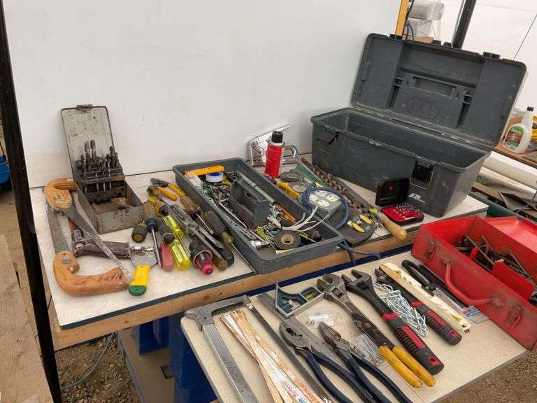 Plastic toolbox comes with the quantity of miscellaneous tools, including crescent  wrenches, screwd