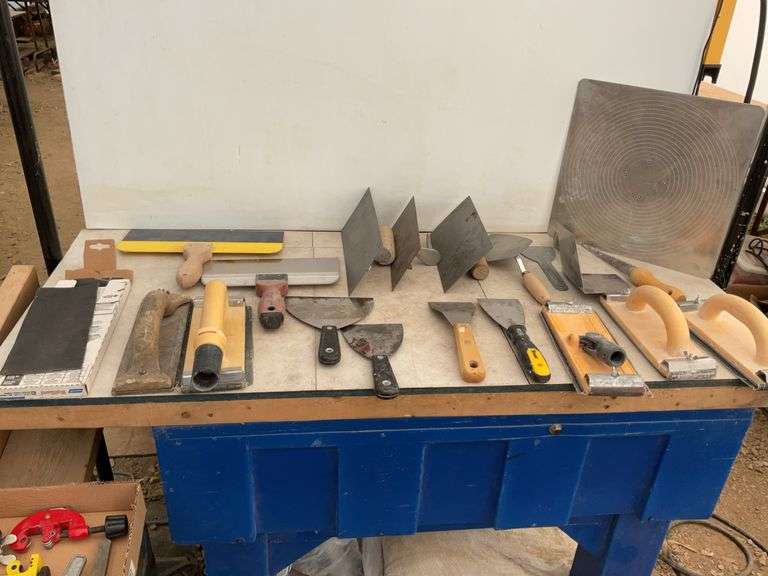 Quantity of drywall trowels and sanding  blocks etc.