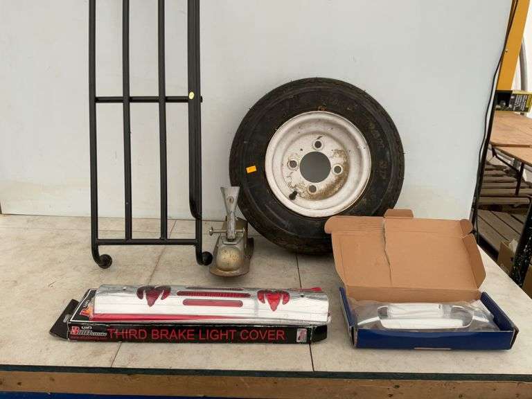 4.8 0x8 tire and four bolt hole rim, 1 7/8" hitch coupler, third brake light cover for a Dodge, end