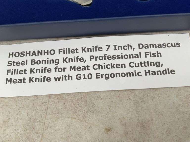 Unused  7" Damascus, steel filleting knife