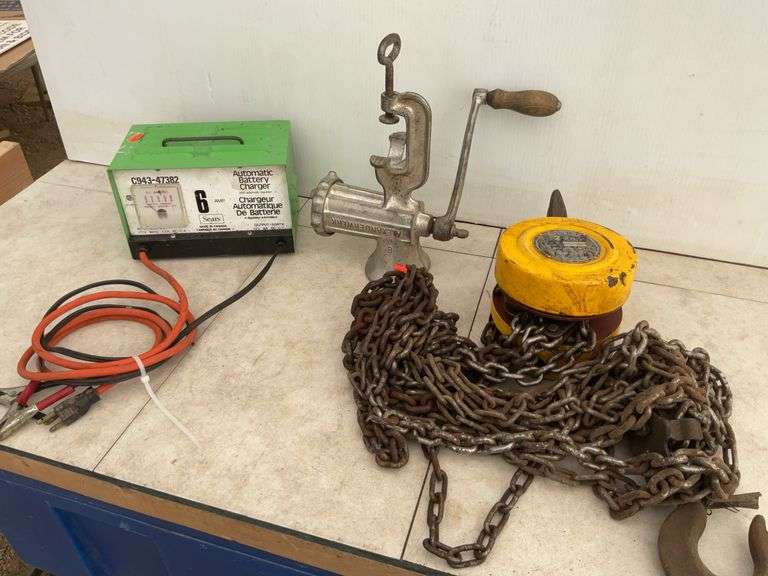 2 ton chain hoist, 6 amp battery charger - owner says works, and a #8 food grinder