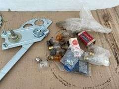 Set of unused window cranks for Model T, Model T light bar, and miscellaneous lightbulbs and brushes